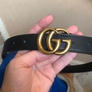 GG black belt .. never worn. Belt in brass color